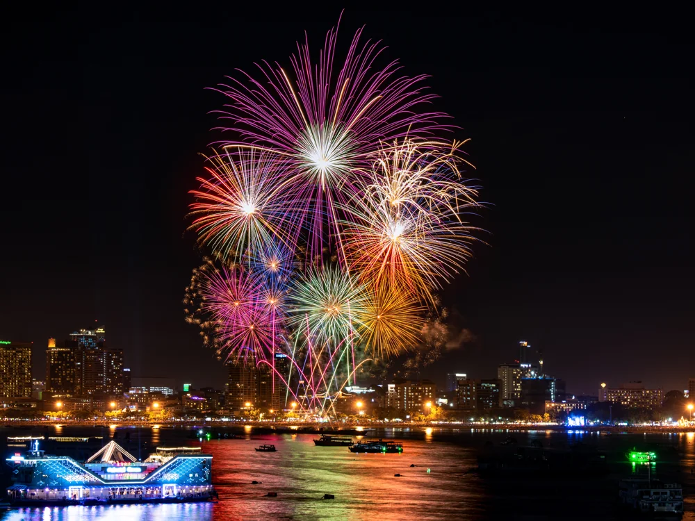 Fireworks over Pattaya Bay at night
