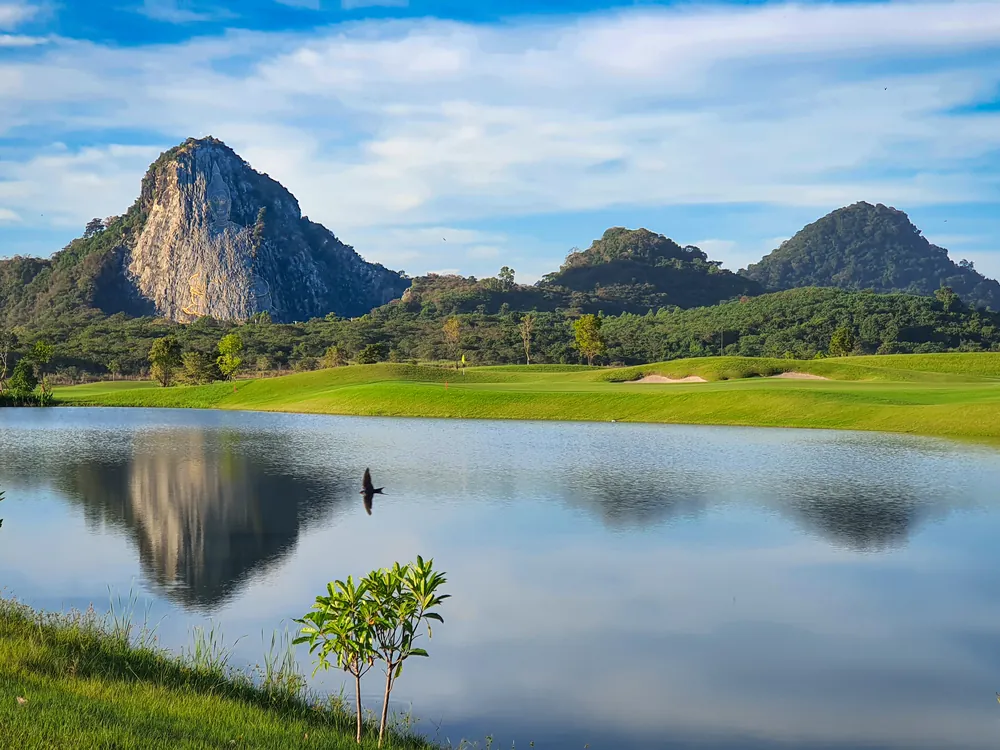 Golf course near Pattaya with mountains behind