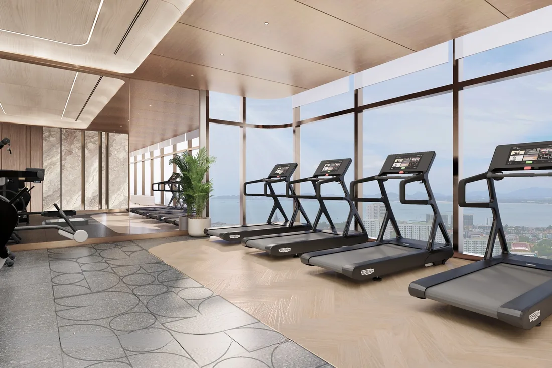 Sky fitness studio with cardio equipment and sea views