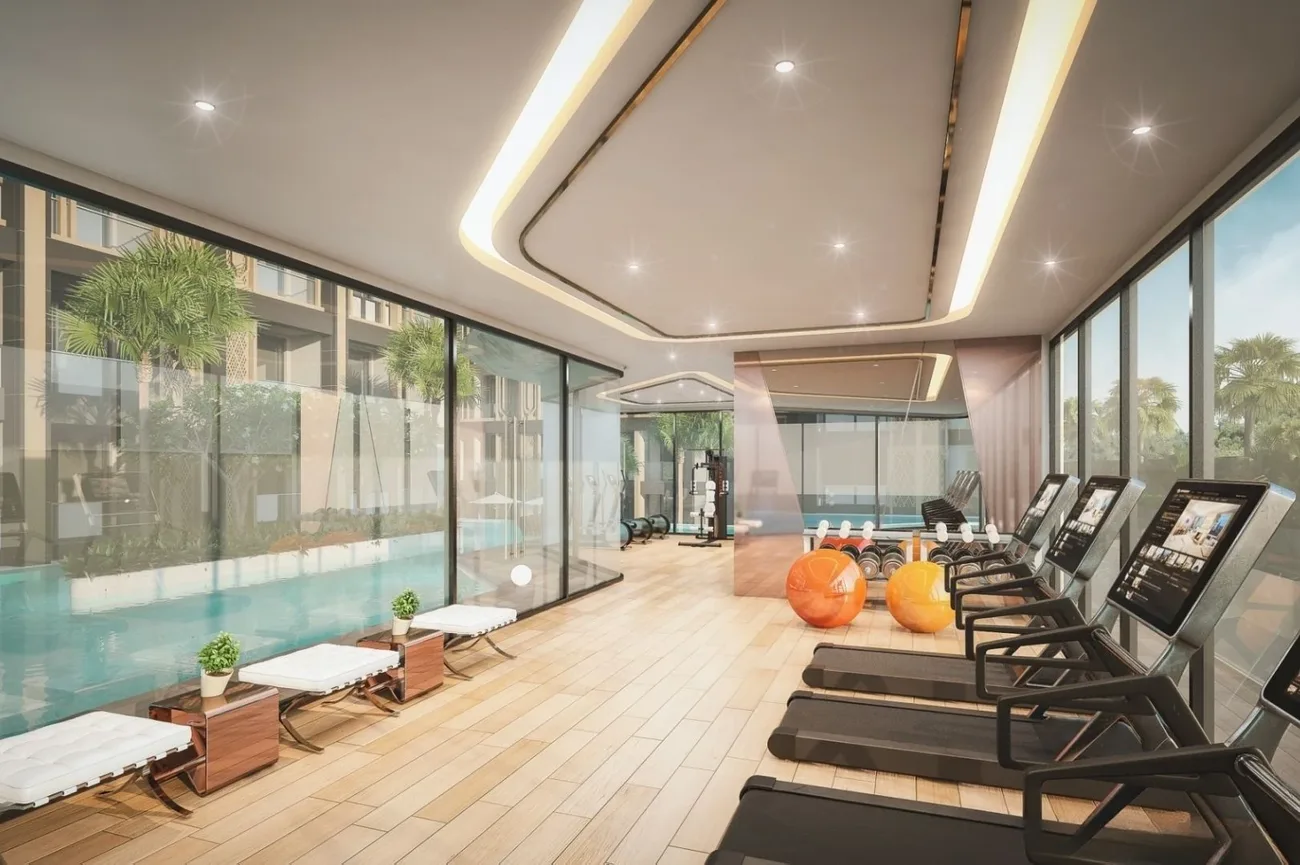 Fully equipped gym overlooking the pool at Pristine Park 3