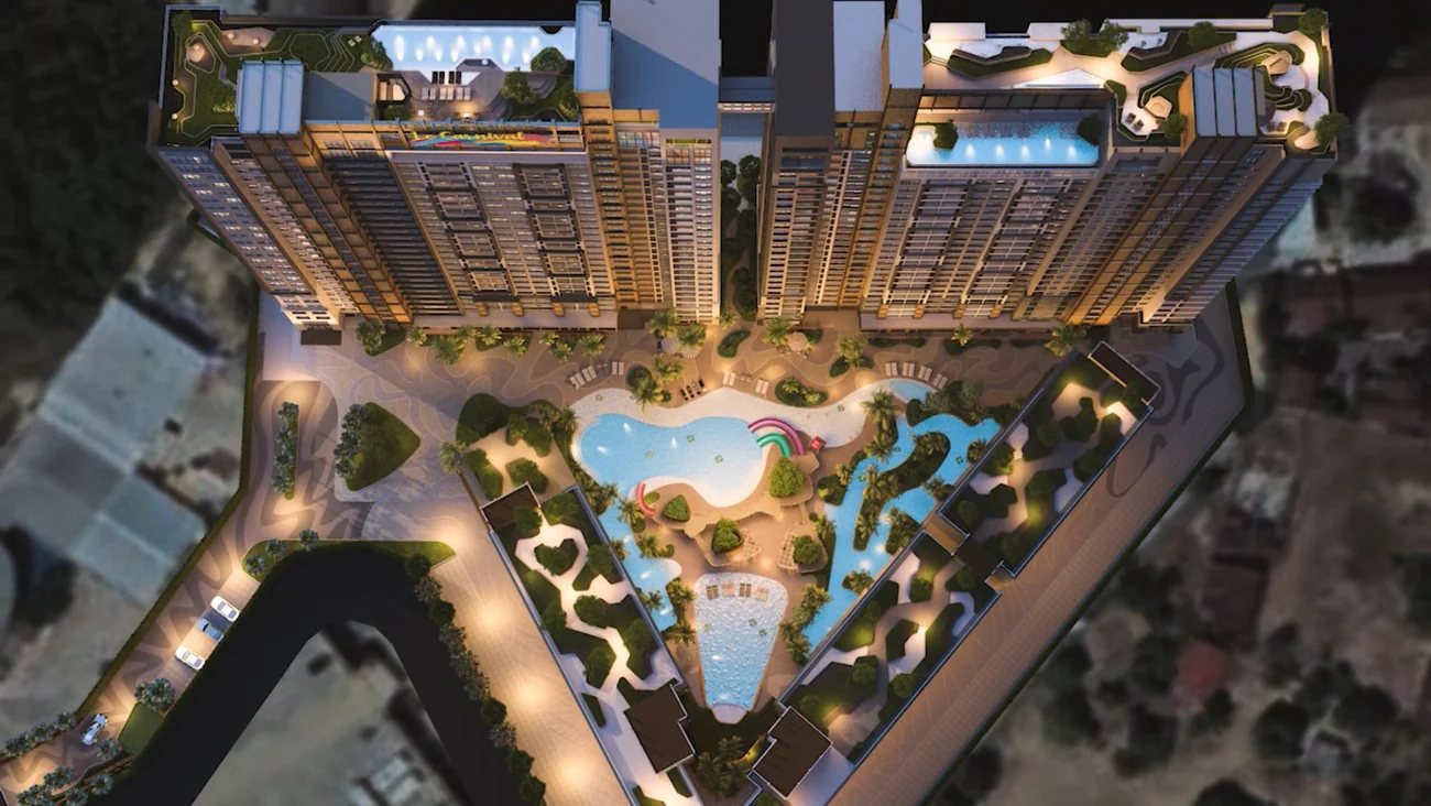 Aerial view of the lagoon water park between the towers at night