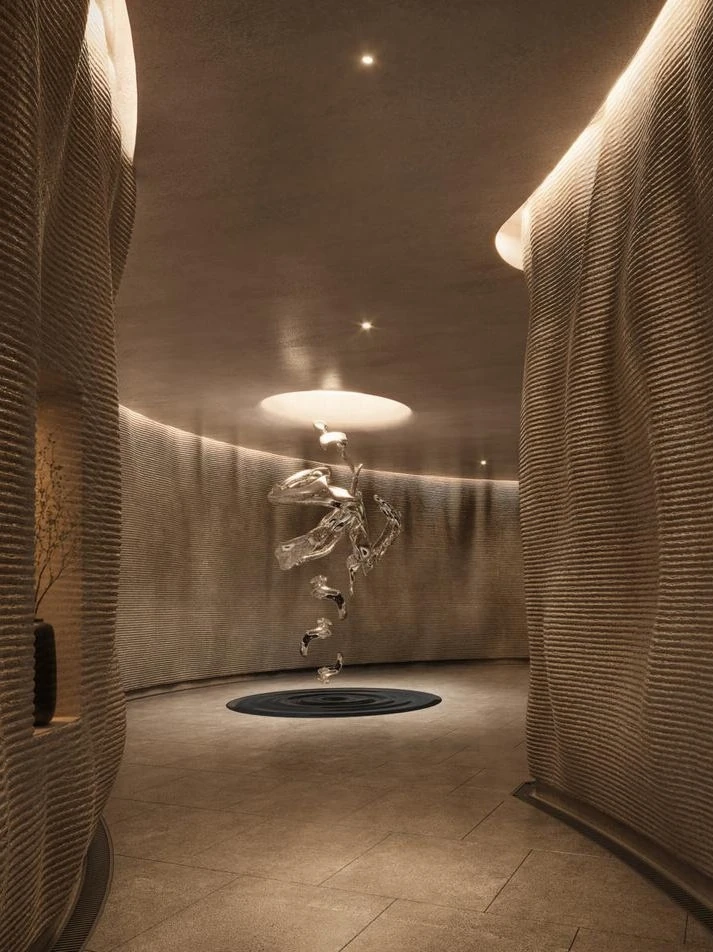 Sculptural wellness corridor with a suspended glass artwork at Soondri Wongamat