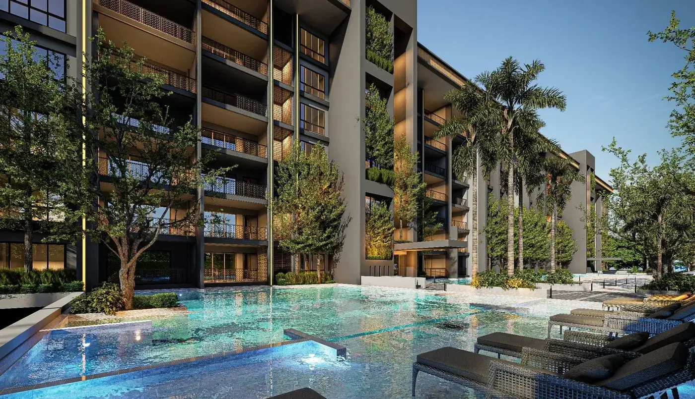 Saltwater pool and sun loungers at Zensiri Residences