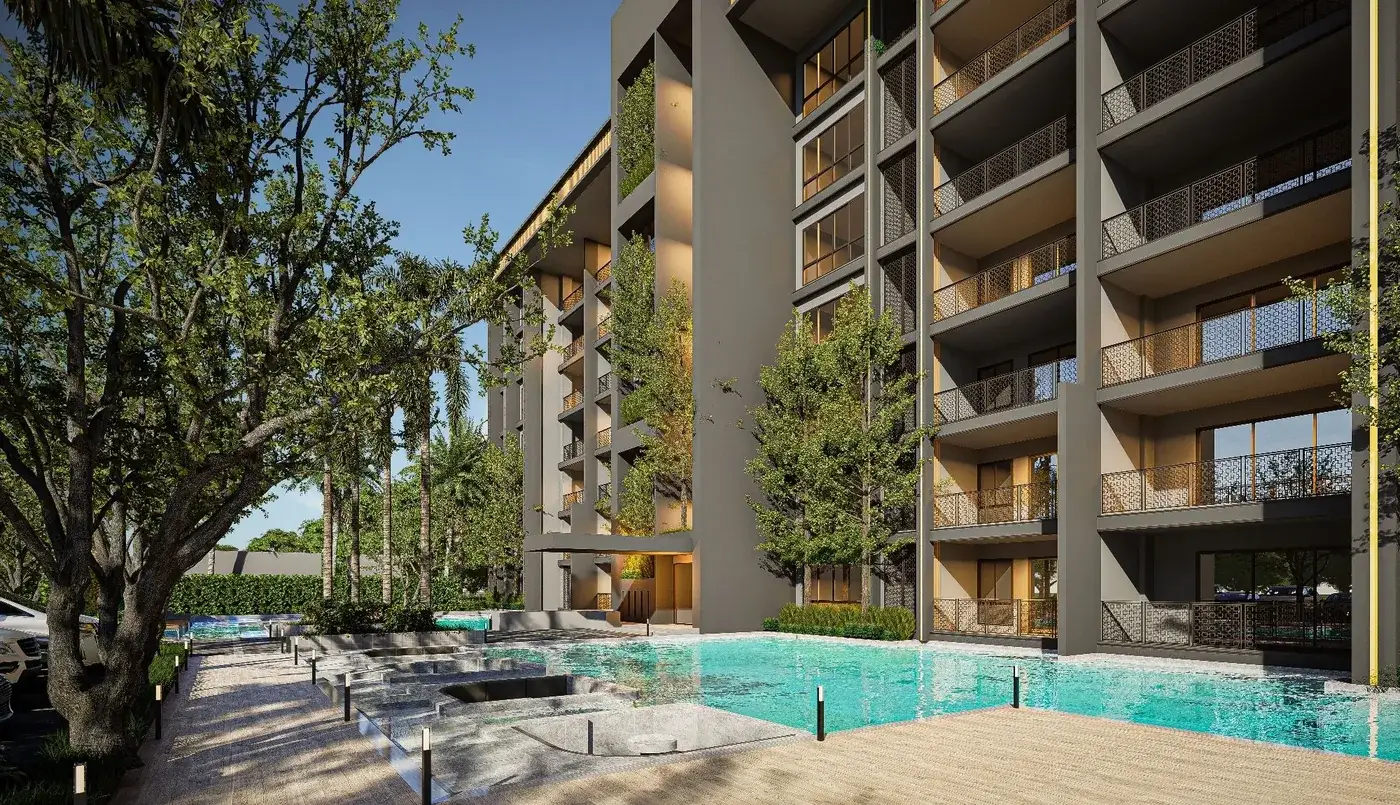 Pool deck and gardens at Zensiri Residences